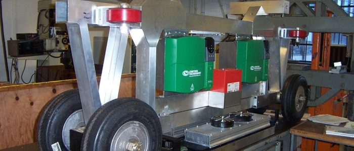 Small vehicle chassis supports and moves passenger cabin.